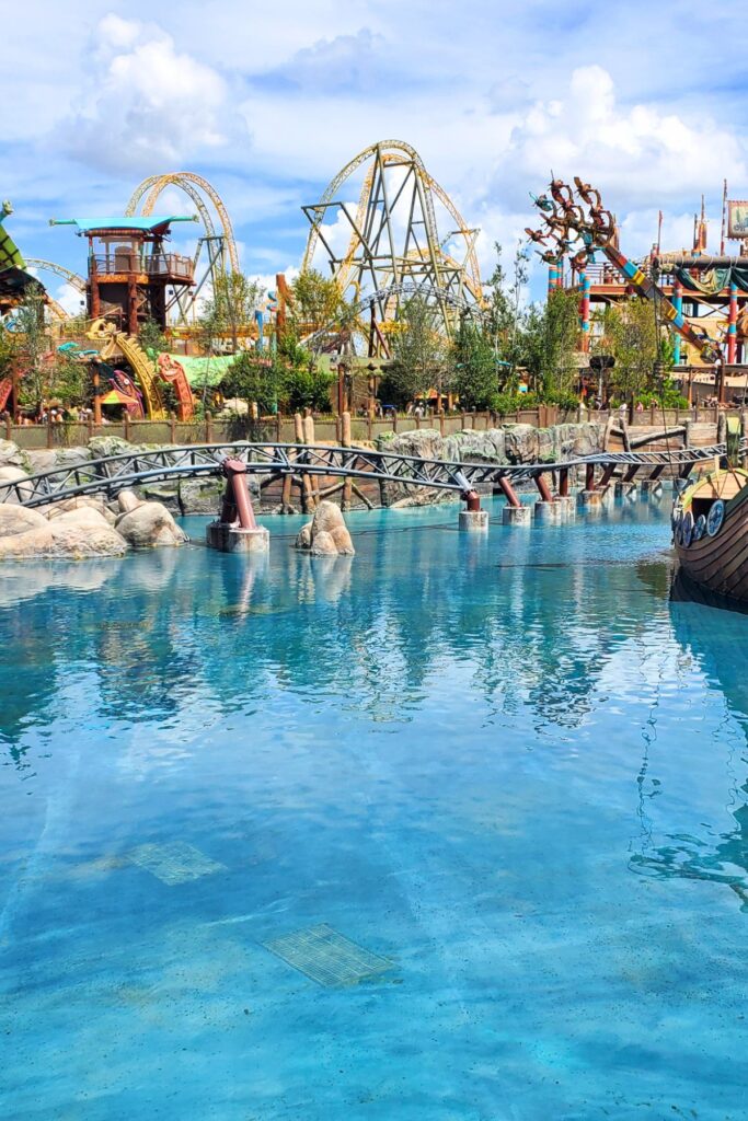 a view of Hiccups Wings Gliders at Epic Universe above bright blue water